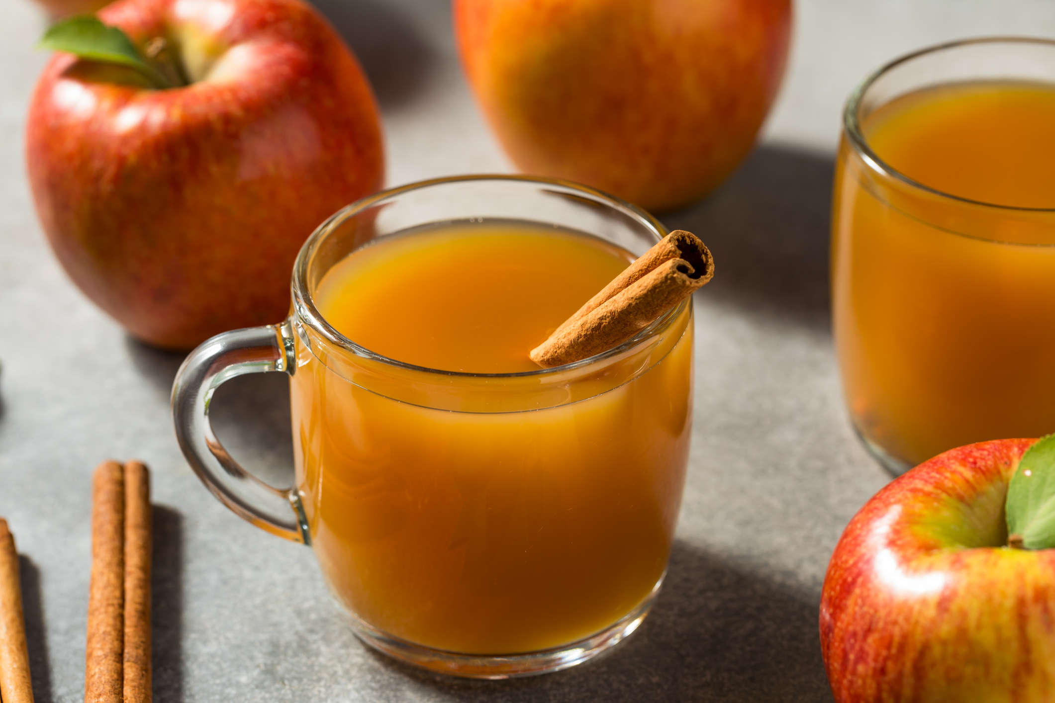 Warm Homemade Apple Cider with a Cinnamon Stick