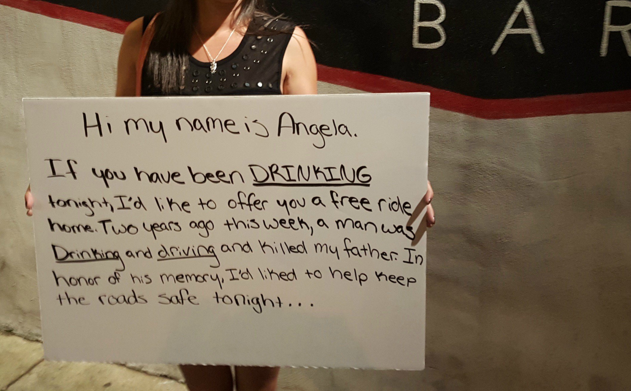 01-She-stood-outside-of-the-bars-holding-this-sign.jpg 01-She-stood-outside-of-the-bars-holding-this-sign.jpg