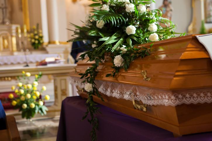 Flowers on a coffin in the church