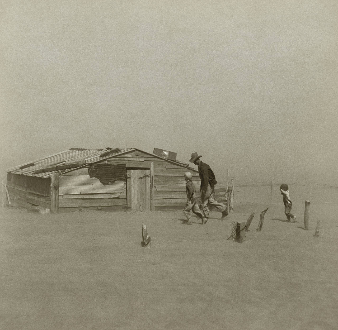 1280px-Farmer_walking_in_dust_storm_Cimarron_County_Oklahoma2.jpg