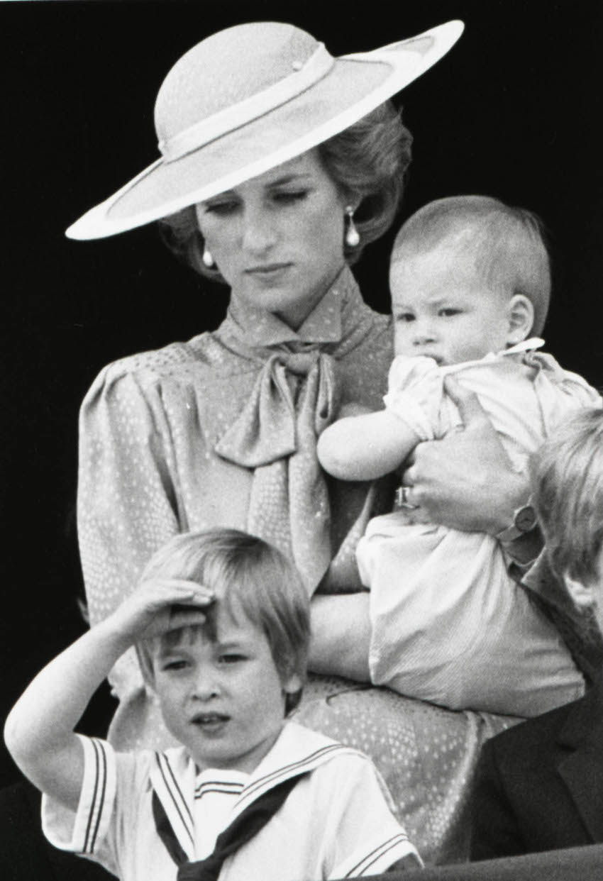 File photograph shows Prince William making a royal salute as he watches the scene of Trooping the Colour from the balcony of Buckingham Palace