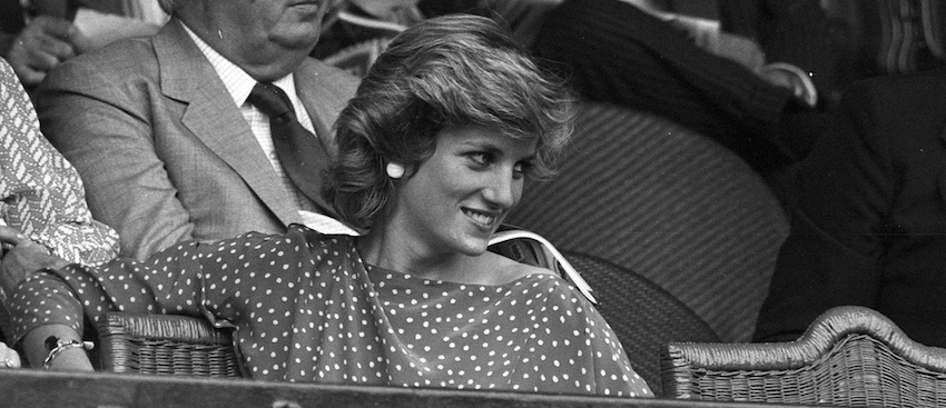 PRINCESS OF WALES LOOKS TOWARDS CENTRE COURT AS SHE SITS IN ROYAL BOX AT WIMBLEDON.