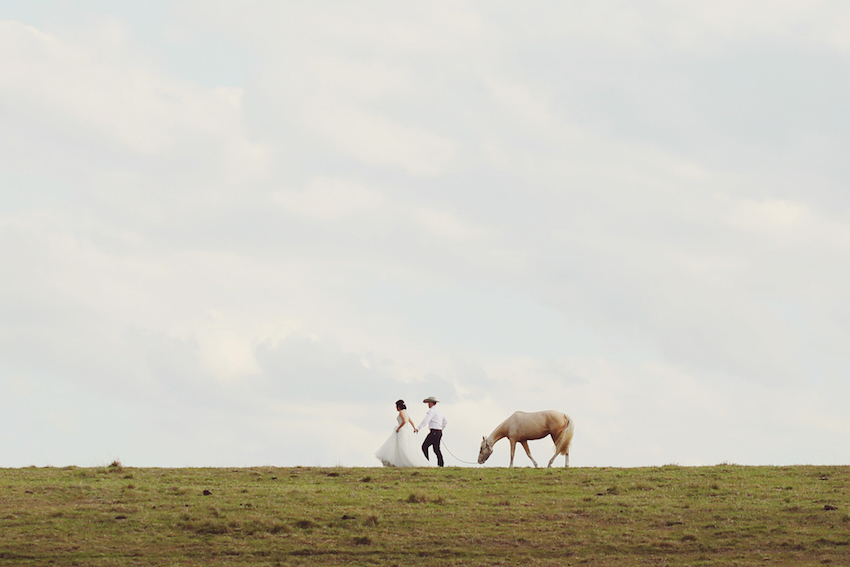 NEWLY WEDS CHASED BY BULL