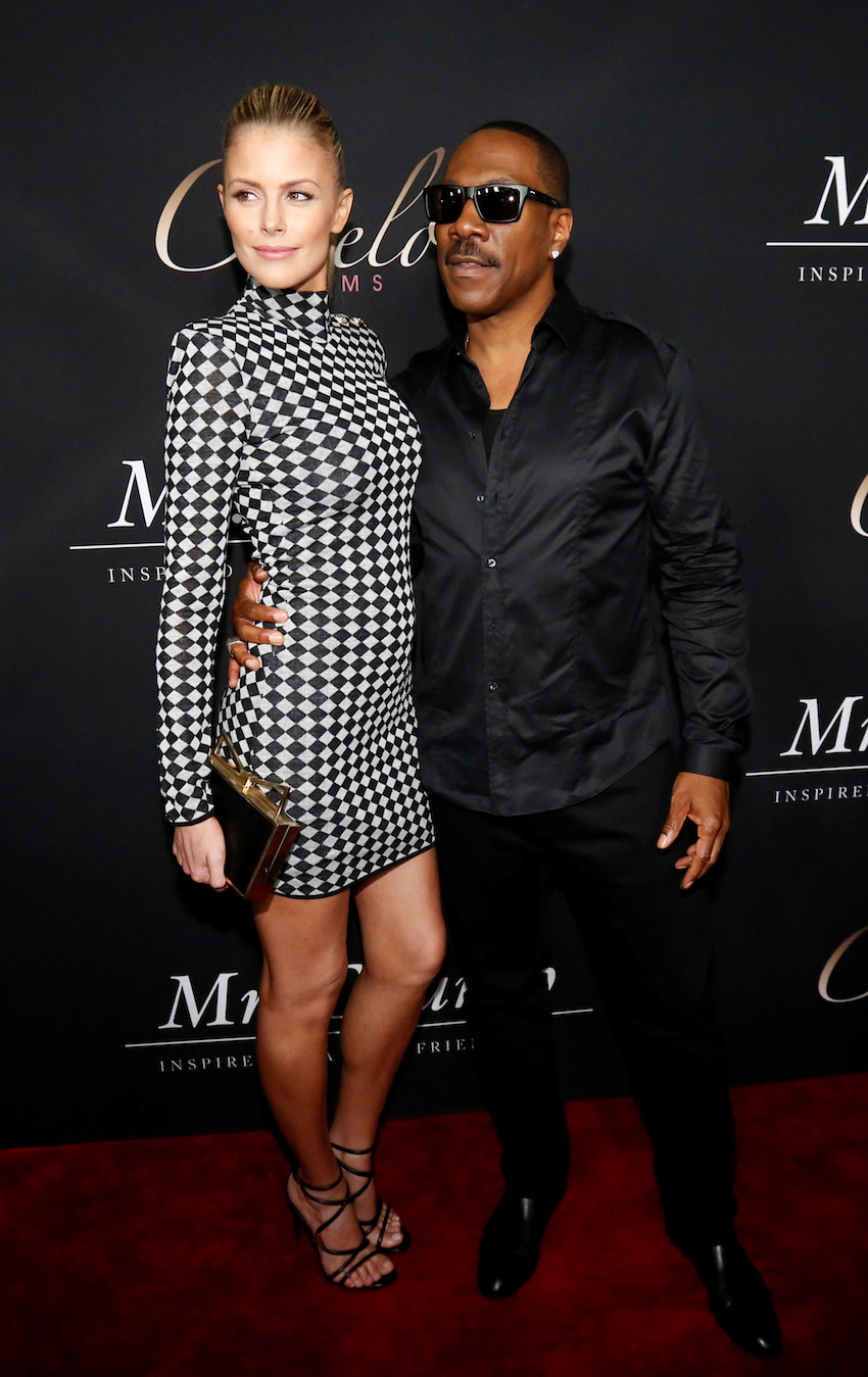 Cast member Murphy and his partner Butcher pose at the premiere of "Mr. Church" in Los Angeles