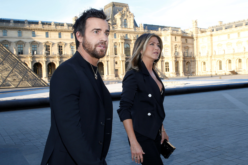 Actress Jennifer Aniston and Justin Theroux arrives to attend a dinner organized by French luxury group Louis Vuitton for the launching of new leather accessories in Paris