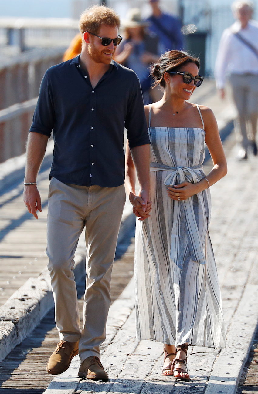 Britain's Prince Harry and Meghan, Duchess of Sussex, arrive to greet members of the public in Kingfisher Bay on Fraser Island in Queensland