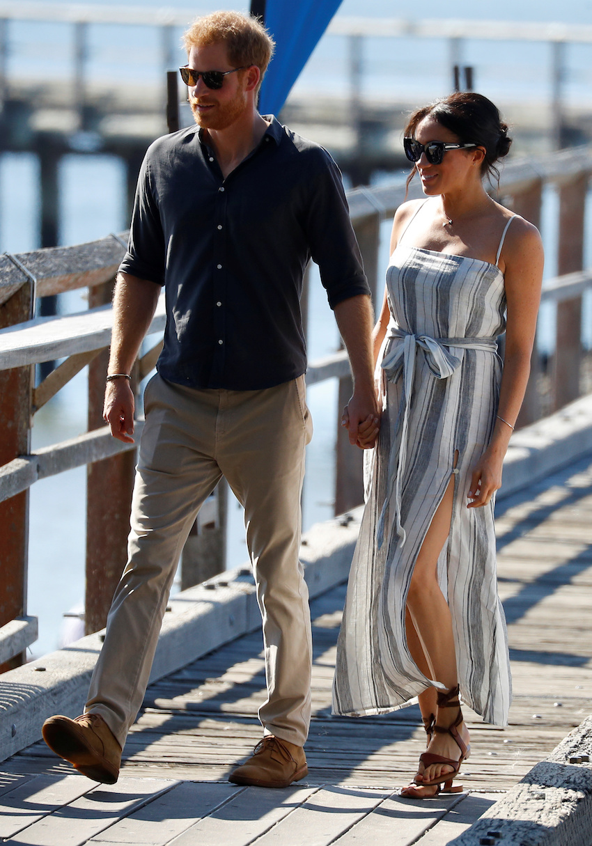 Britain's Prince Harry and Meghan, Duchess of Sussex, arrive to greet members of the public in Kingfisher Bay on Fraser Island in Queensland