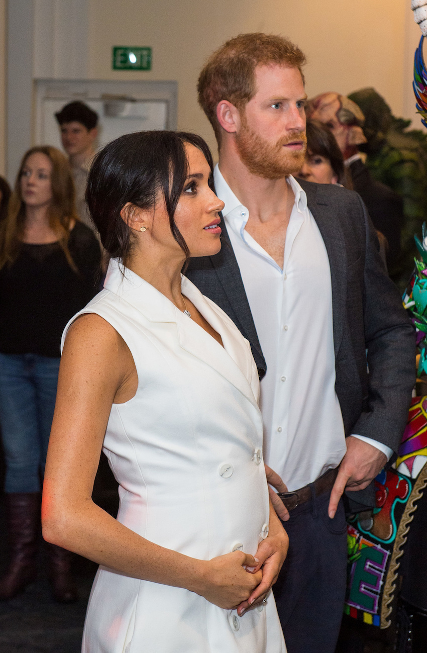 Britain's Prince Harry and Meghan, the Duke and Duchess of Sussex, visit Courtenay Creative, in Wellington, New Zealand