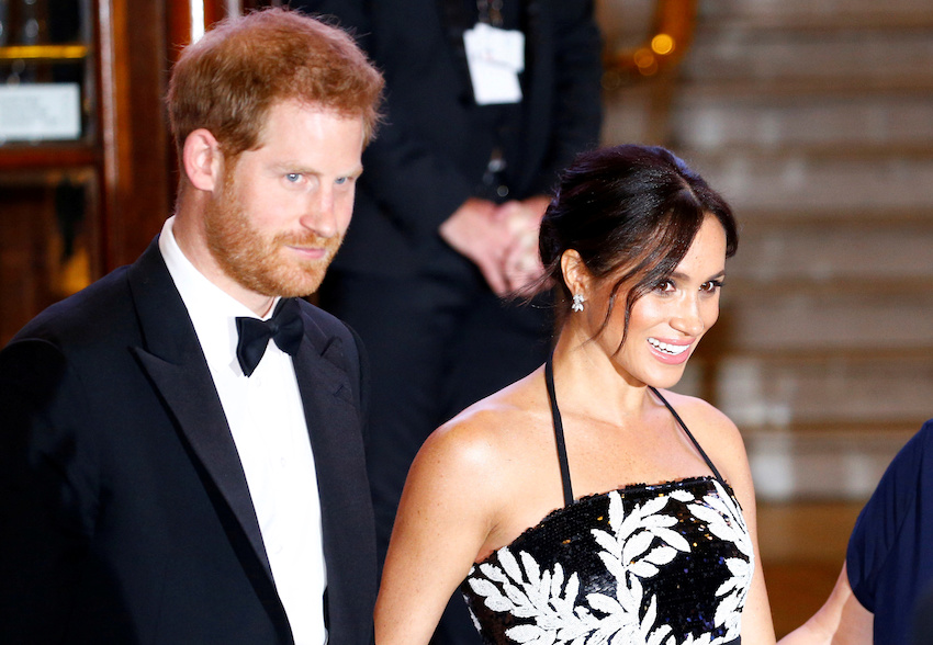 FILE PHOTO: Britain's Prince Harry and Meghan, the Duchess of Sussex, leave after the Royal Variety Performance in London