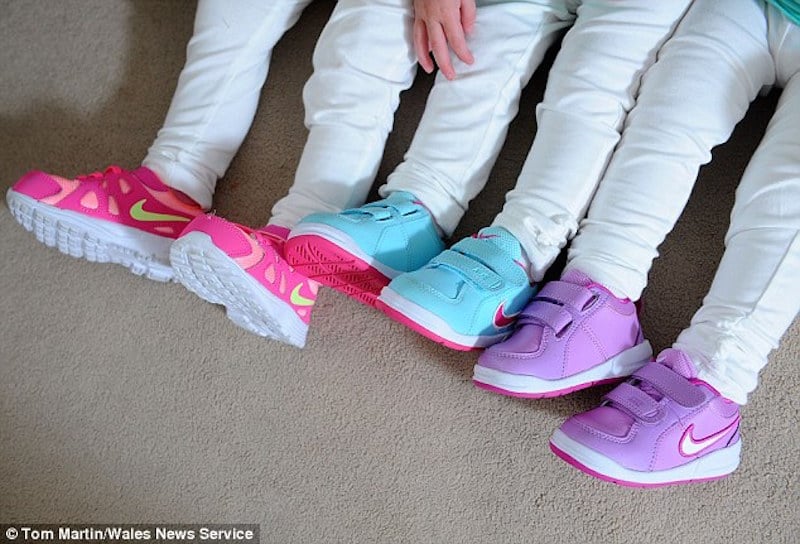 2B170D3E00000578-3184910-Each_little_girl_has_their_own_Nike_trainers_Ffion_in_fuchsia_Ma-a-29_1438702697152.jpg