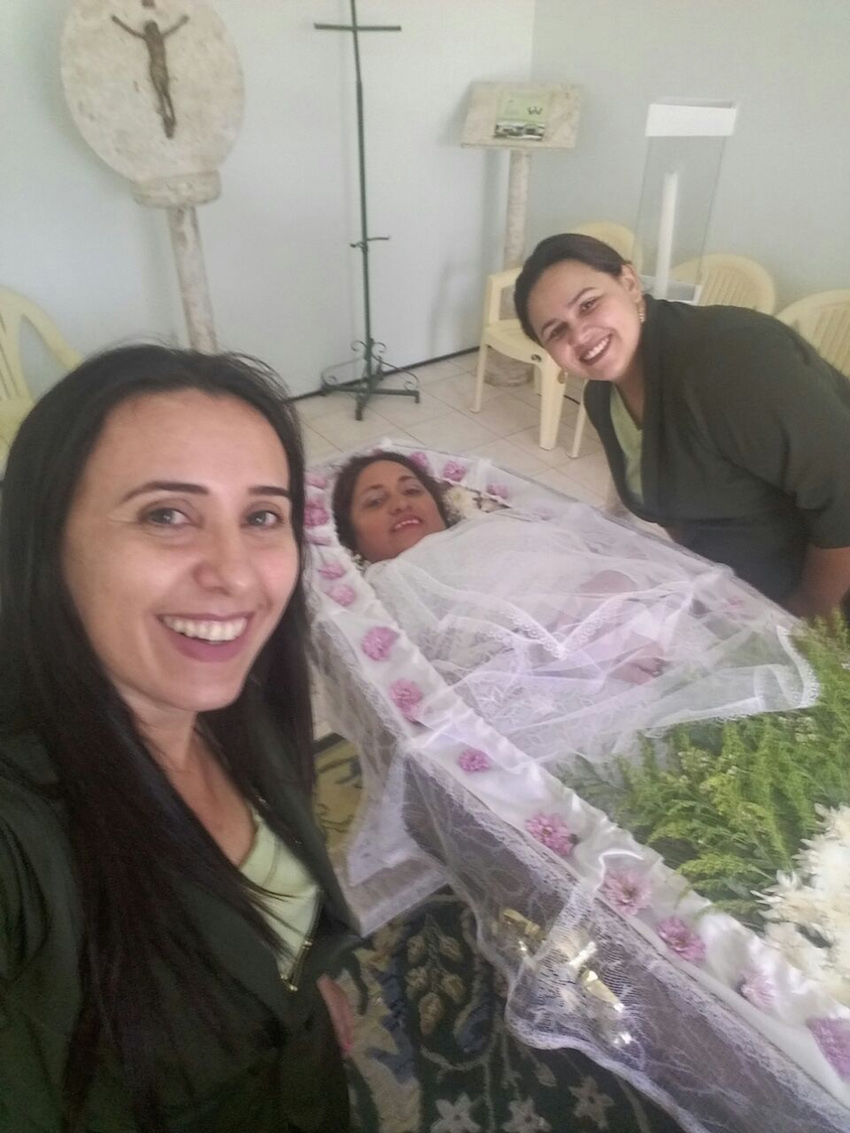 Woman holds fake funeral