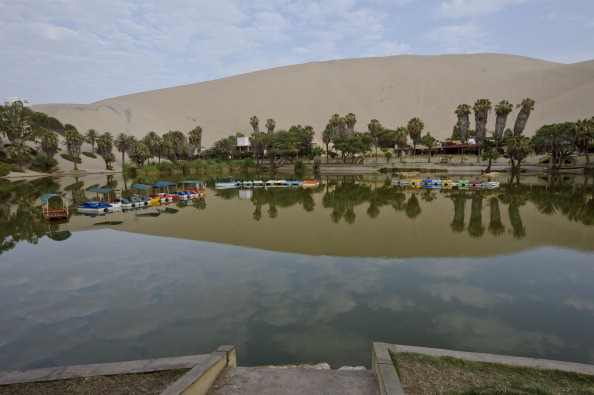 Desert lake at Huacachina Oasis - Peru