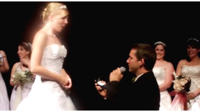 Man pops the question during a wedding event