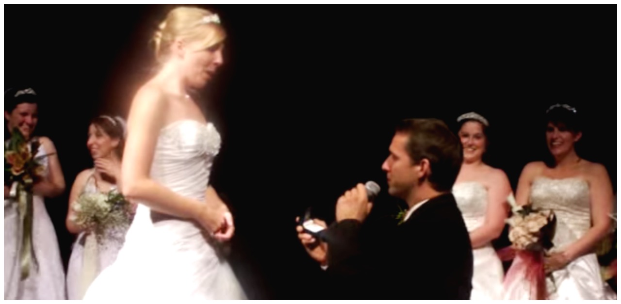 Man pops the question during a wedding event