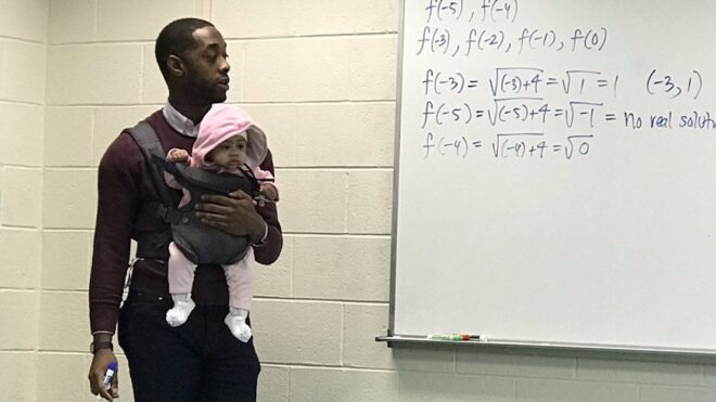 professor-holds-baby