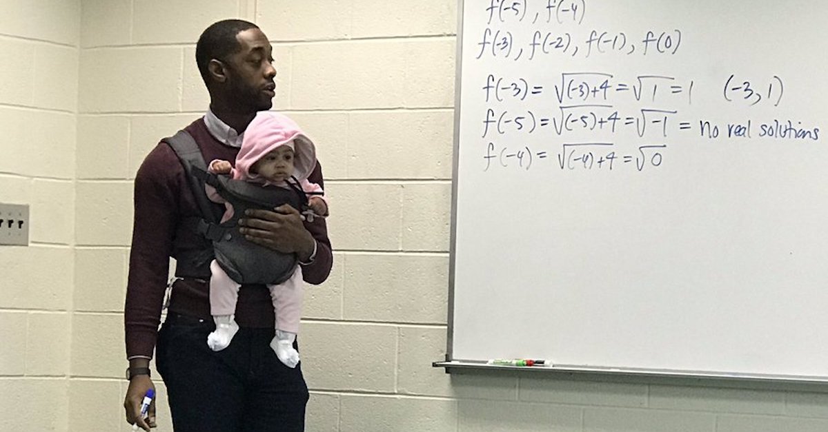 professor-holds-baby