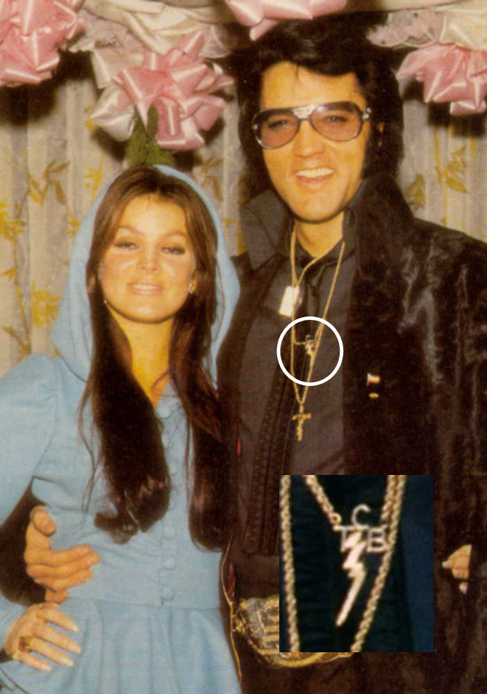 Elvis-wearing-the-TCB-necklace.jpg