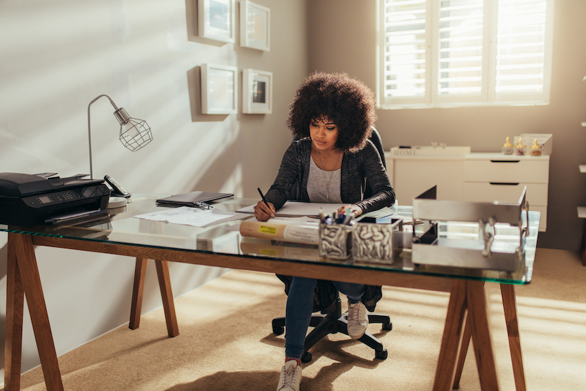 Female interior designer working at home office