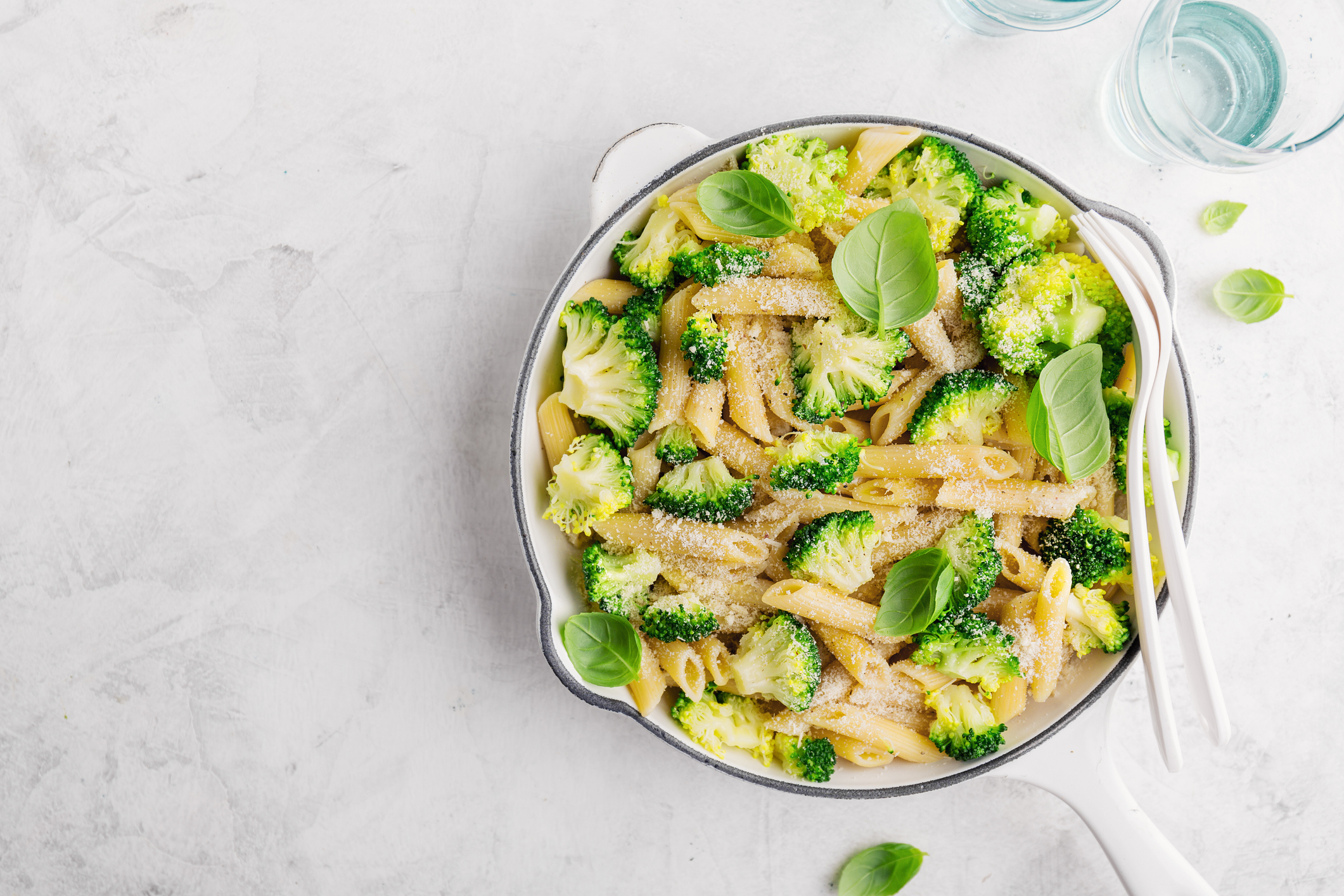 Tasty pasta penne with broccoli and cheese