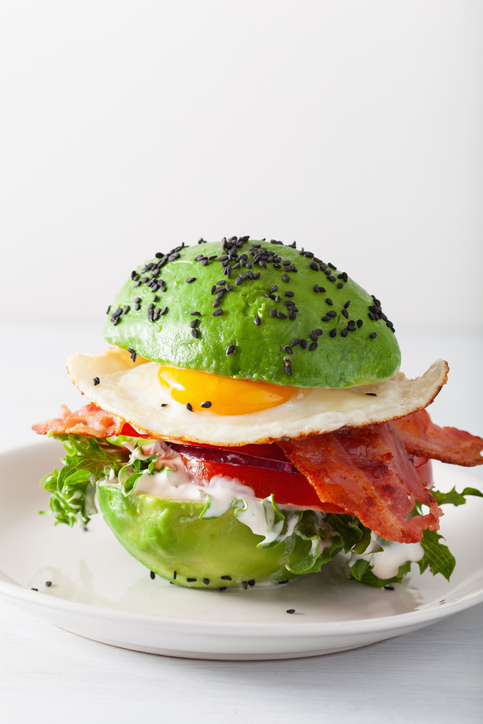 keto paleo diet avocado breakfast burger with bacon, egg, tomato