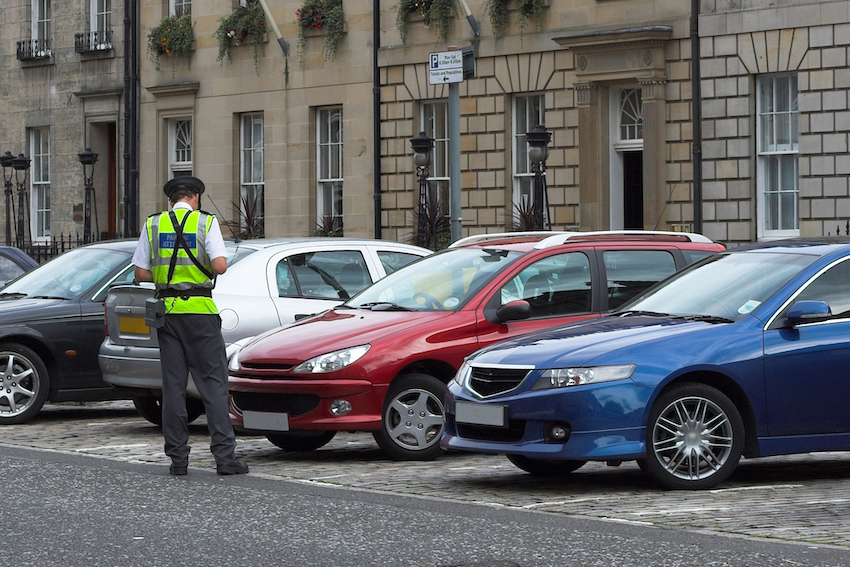 parking attendant, traffic warden, getting ticket fine mandate