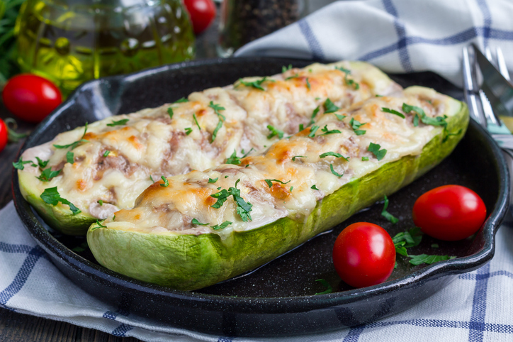 Zucchini boats stuffed with ground meet and topped with cheese