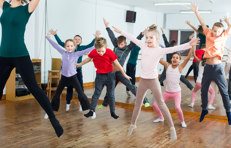 Ordinary boys and girls studying contemp dance