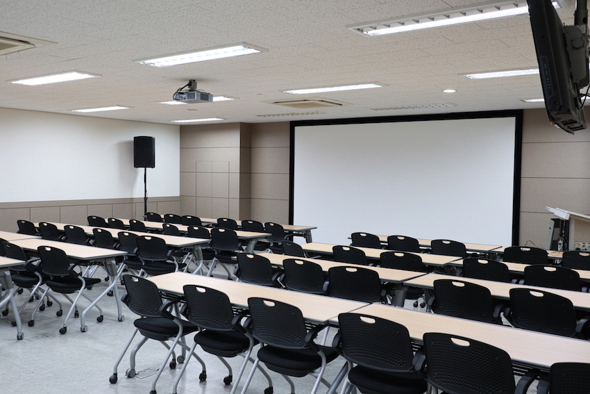 Lecture hall, Empty university classroom with two blocks of chairs