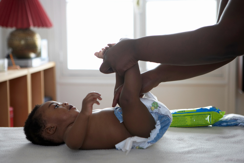 baby having his nappy changed