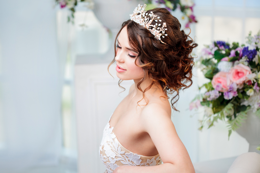 Portrait of beautiful bride in wedding dress