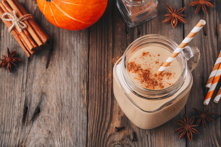 Pumpkin pie smoothie with cinnamon in mason jar