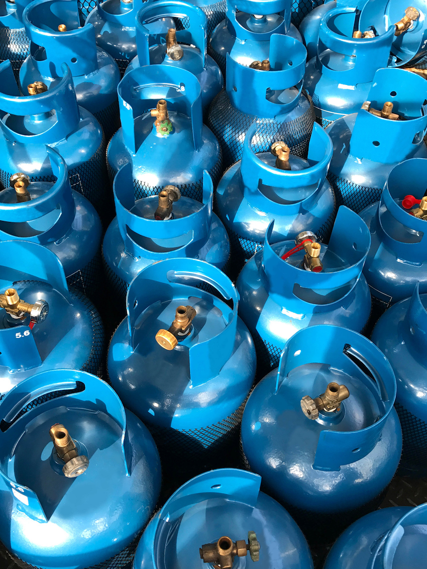Blue LPG tank under sun light