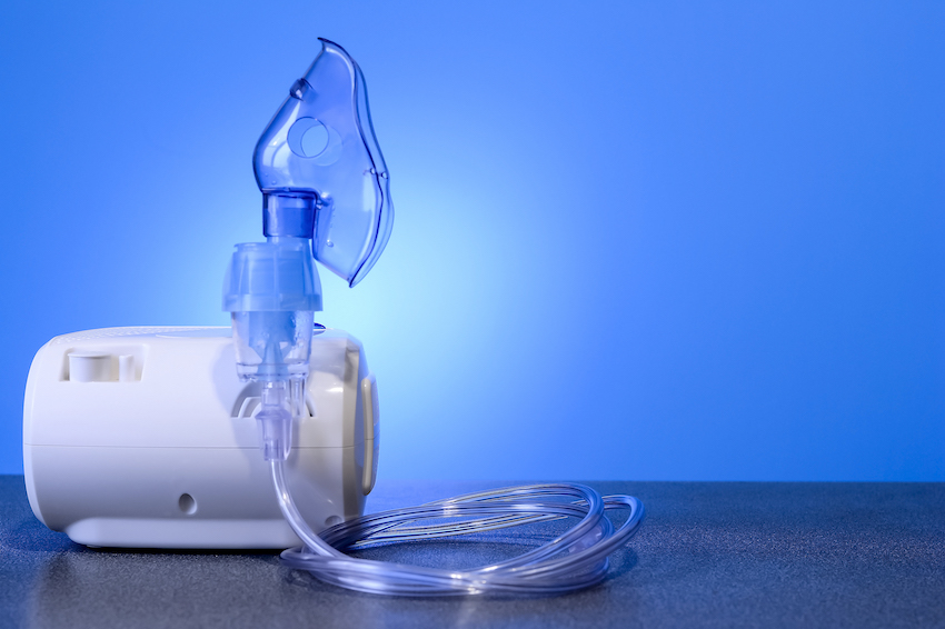 Medical nebulizer for the treatment of bronchitis. Camera agains