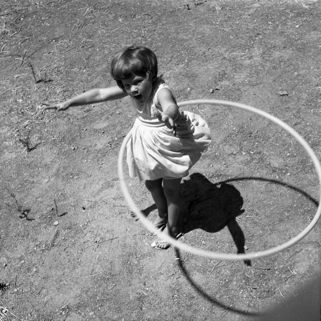 Girl_twirling_Hula_Hoop_1958.jpg