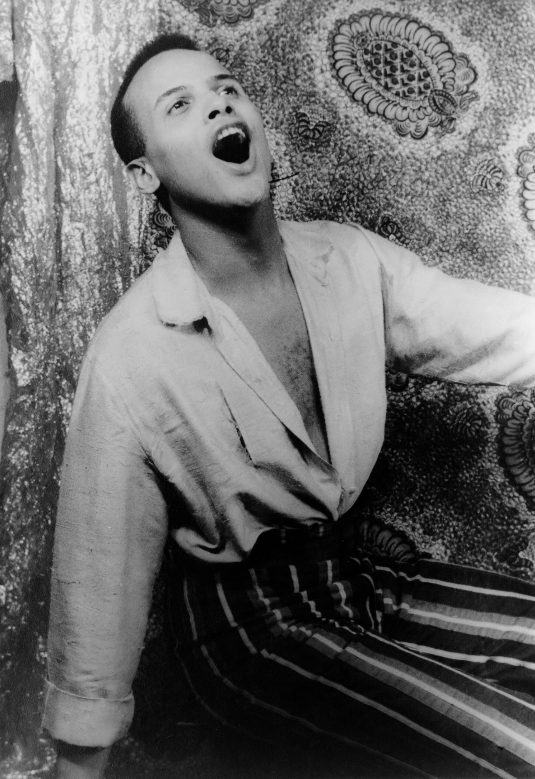 Portrait of Harry Belafonte, singing (1954)