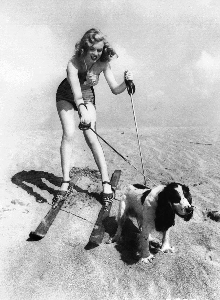 Marilyn-Monroe-wearing-skis-at-the-beach-with-her-dog-Ruffles-1947.jpg