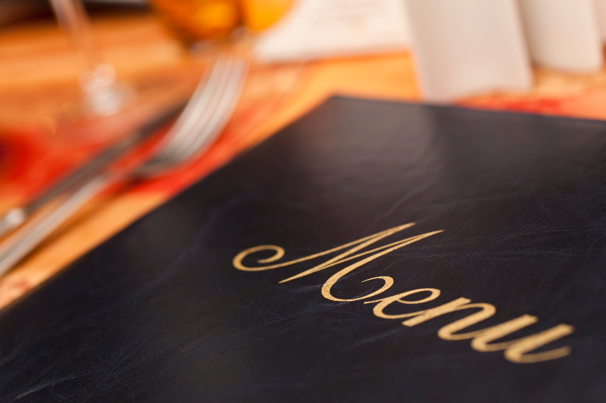 Menu & Cutlery on A Restaurant Table