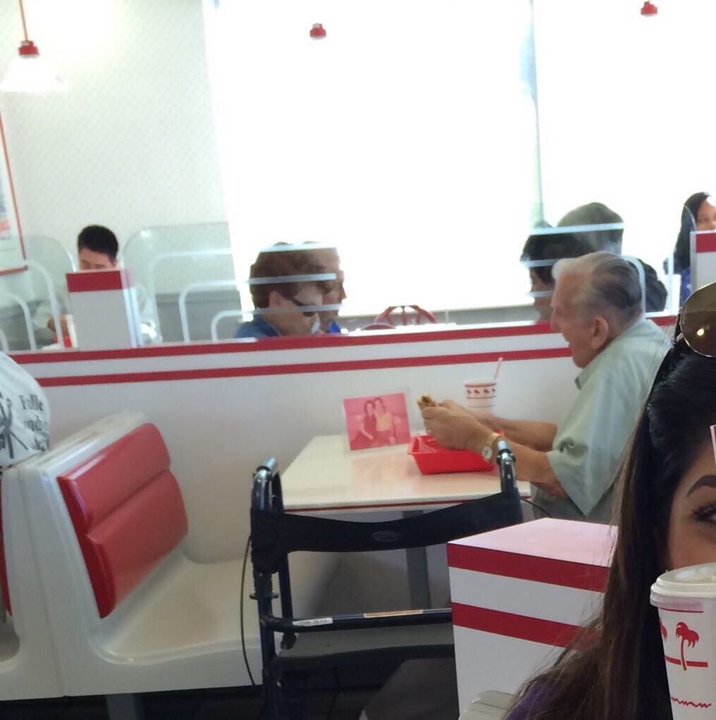 Old-Man-Eating-With-Photo-Of-His-Wife.jpg
