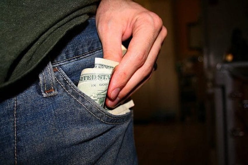 Pocketing_money-600x399-1.jpg