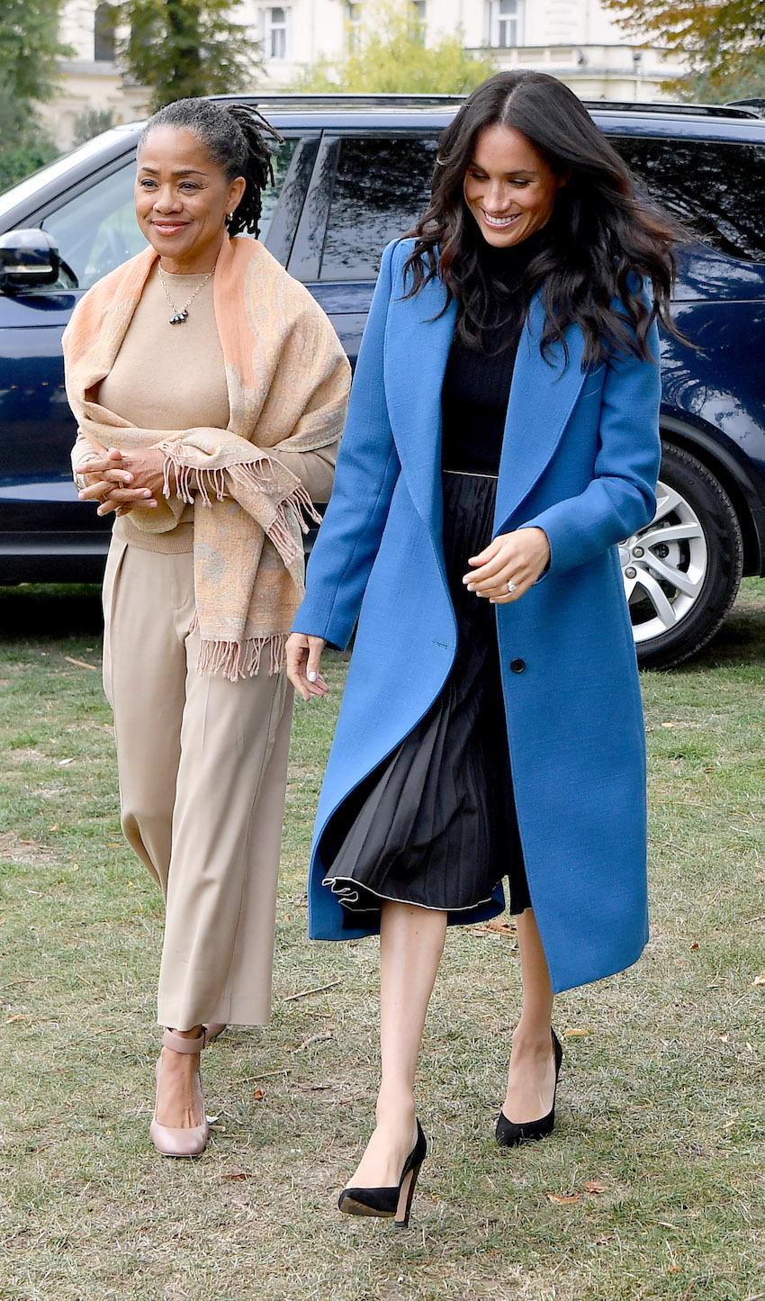 Meghan Markle Duchess of Sussex arrives at event to launch cookbook.