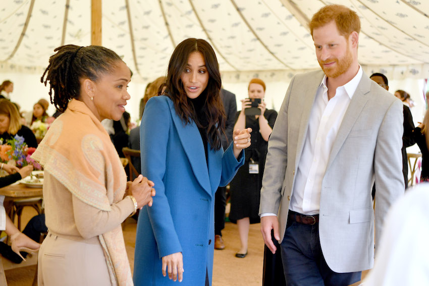 Meghan Markle Duchess of Sussex arrives at event to launch cookbook.