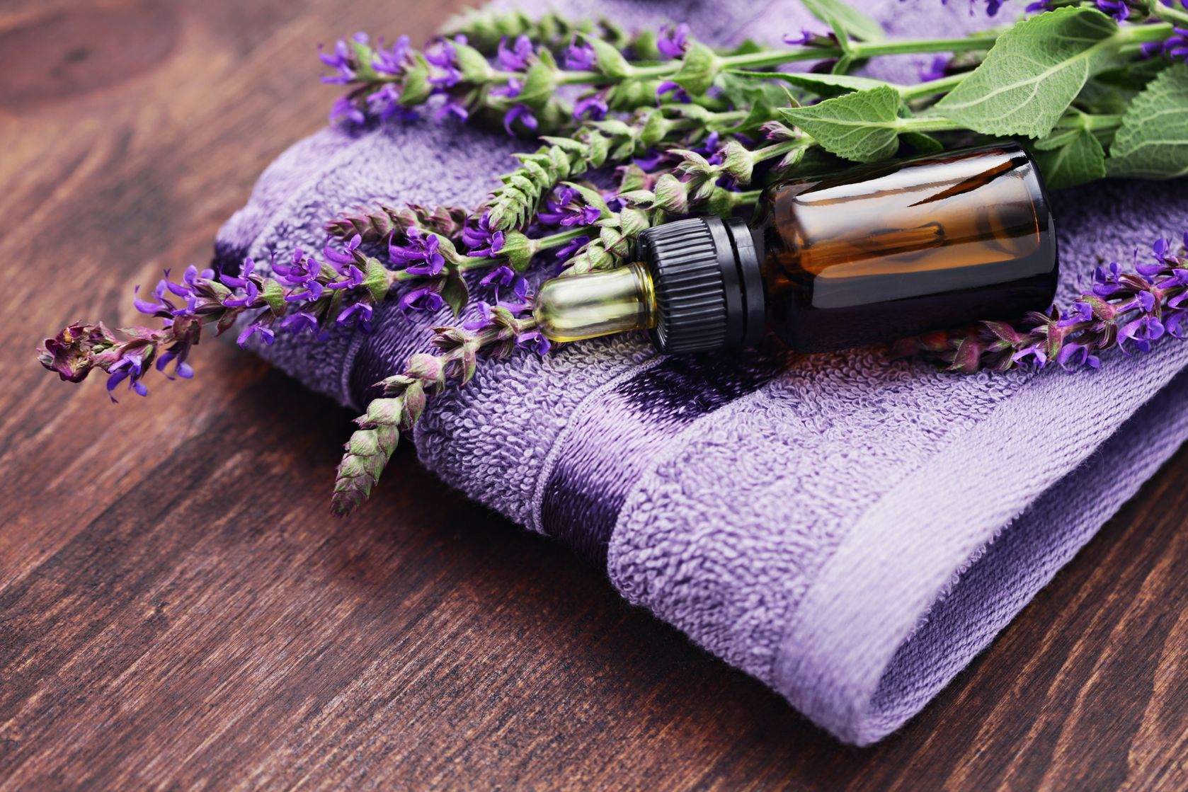 Sage-oil-with-Lavender-and-towel.jpg