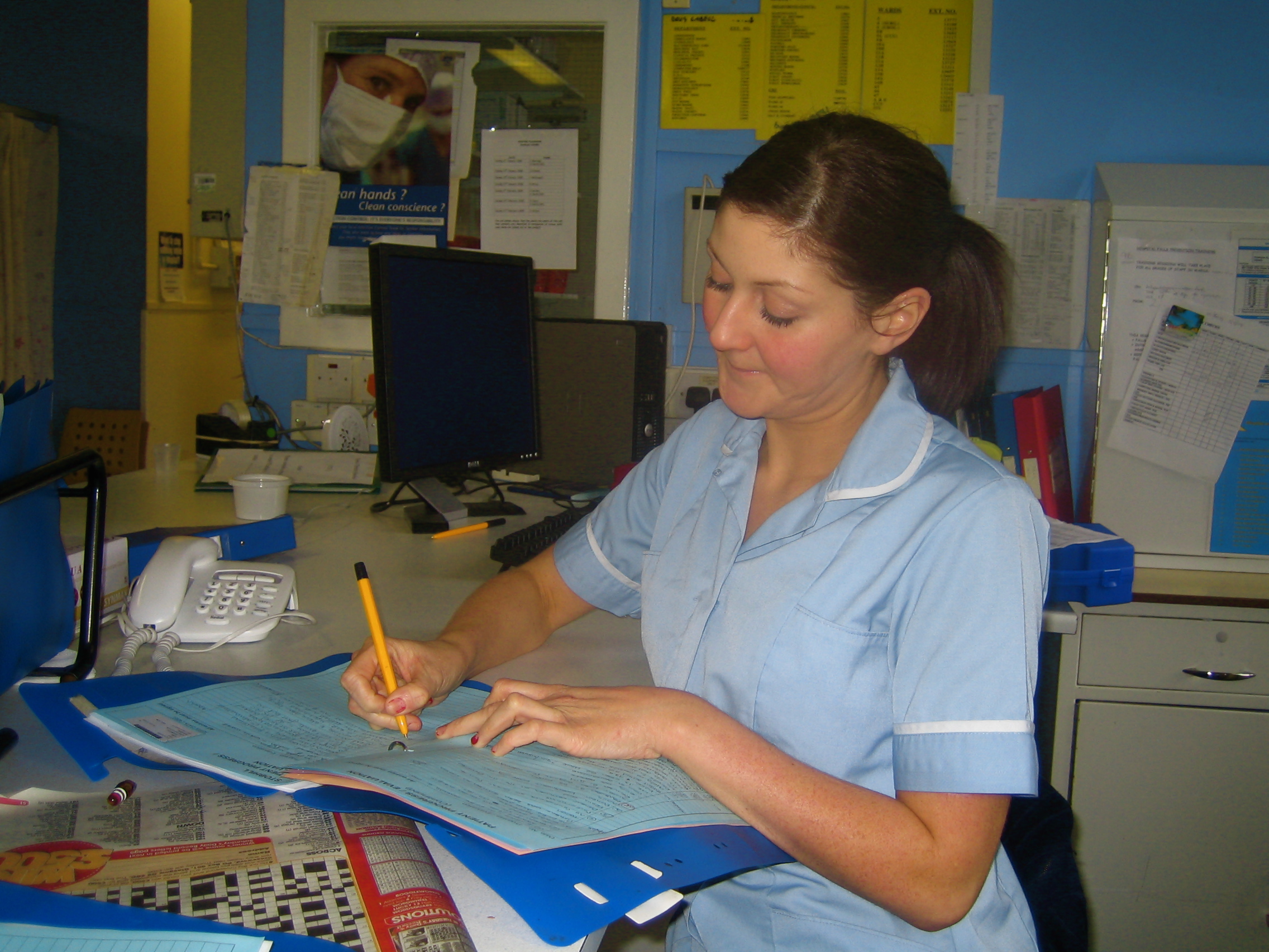Staff_Nurse_Andrea_writing_up_her_notes.jpg