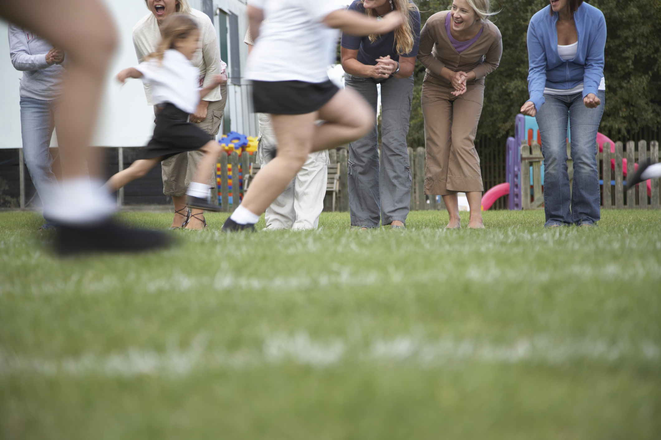 Children (4-8) in school sports day race (blurred motion)