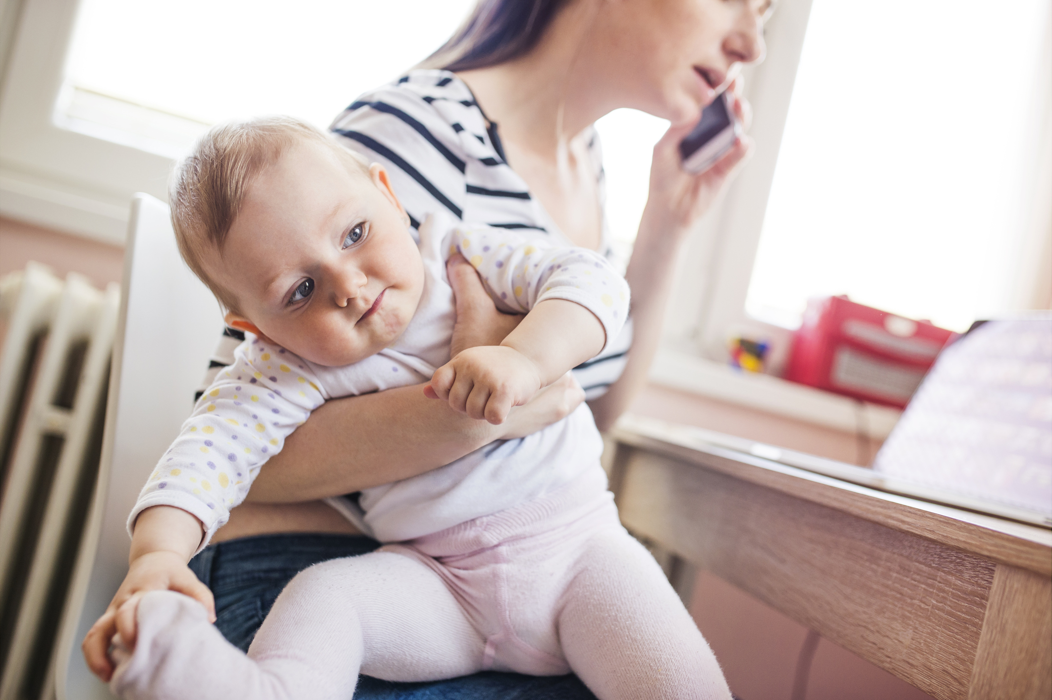 Young mother working from home