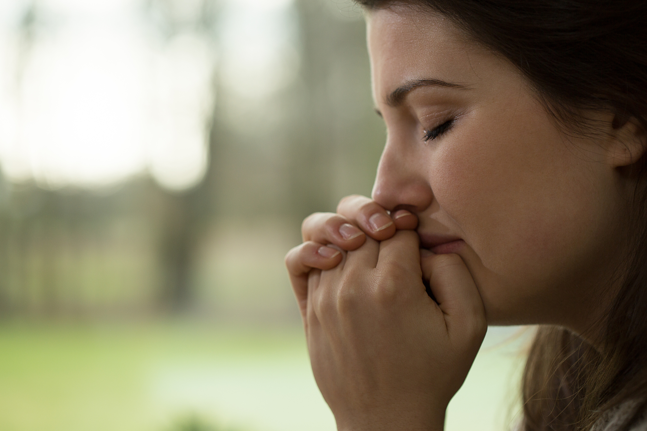 Depressed young woman crying