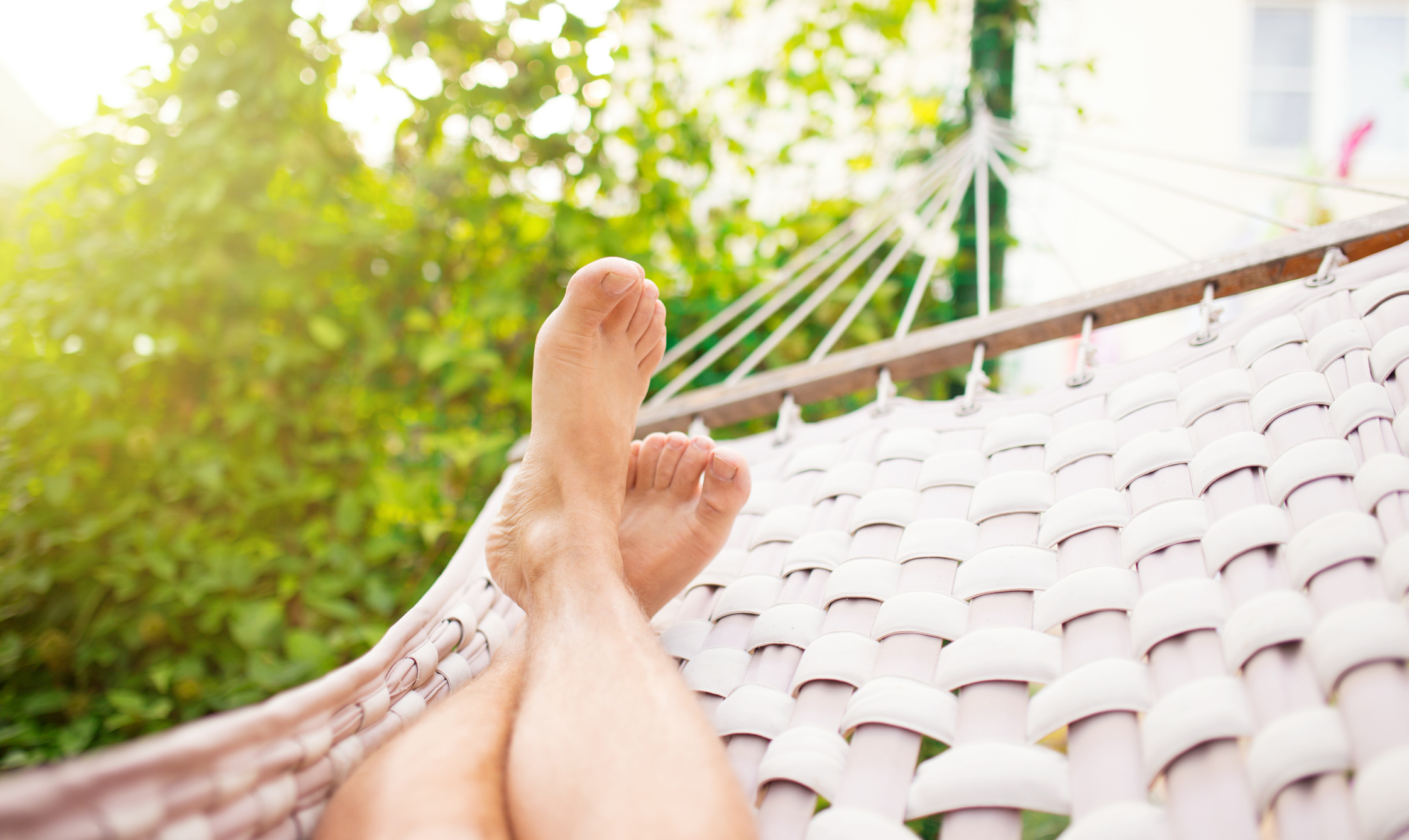 Man in a hammock on a summer day