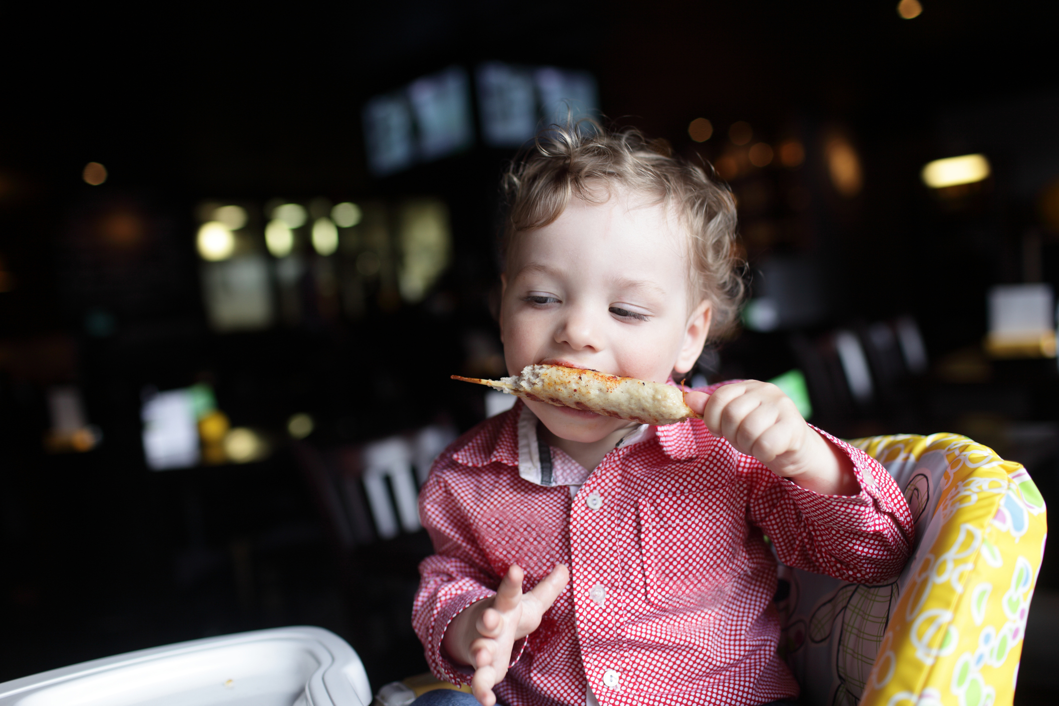 Boy eating kebab