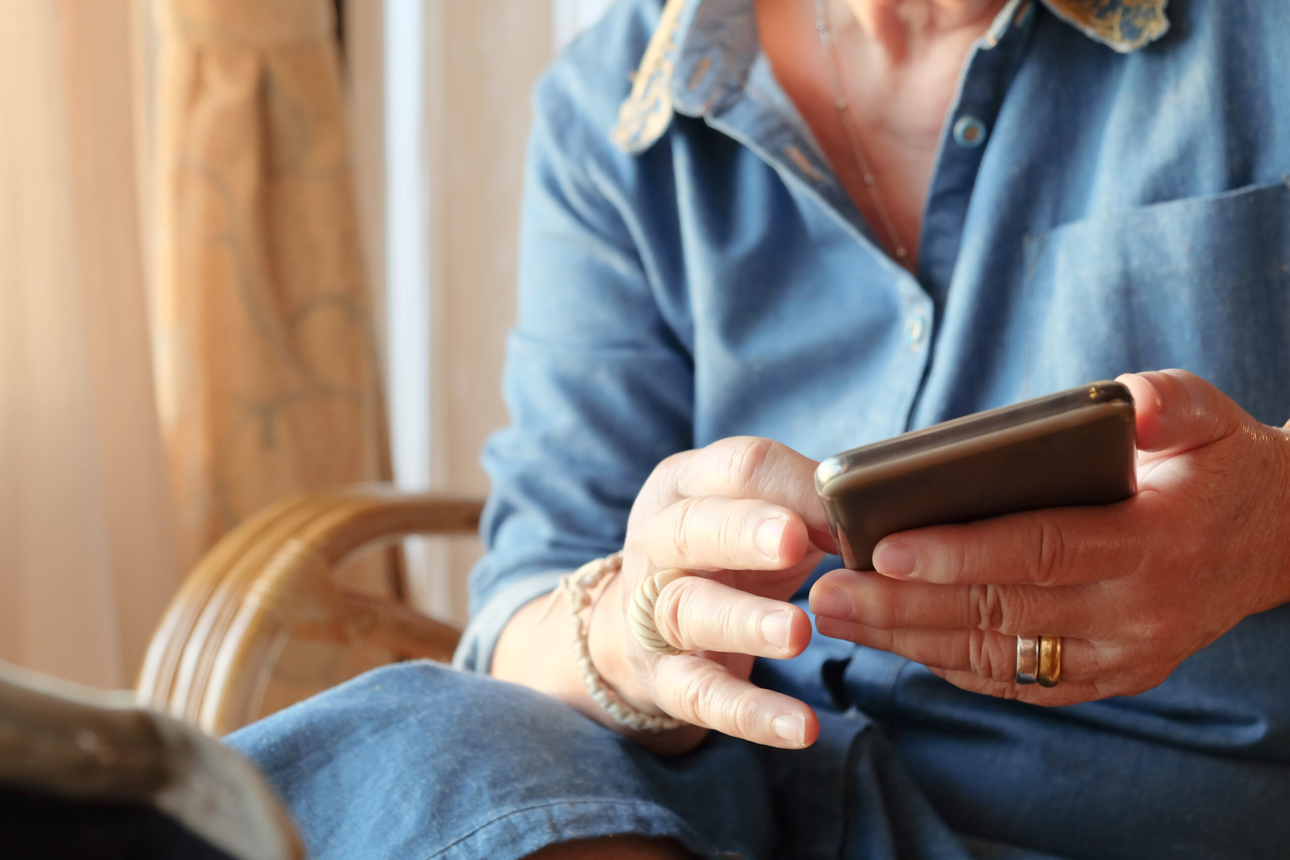 older woman using smart phone