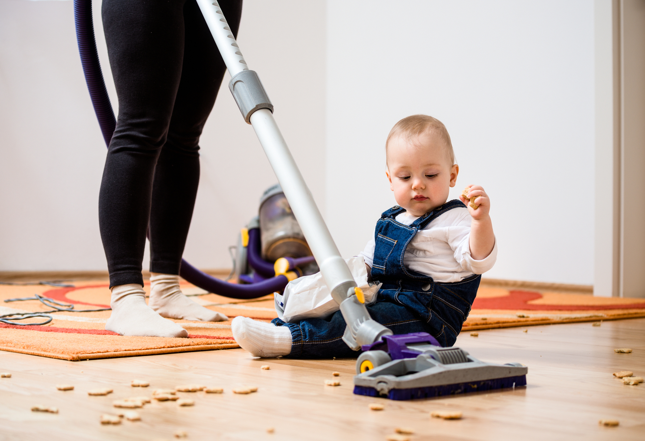 Cleaning home - mother and child